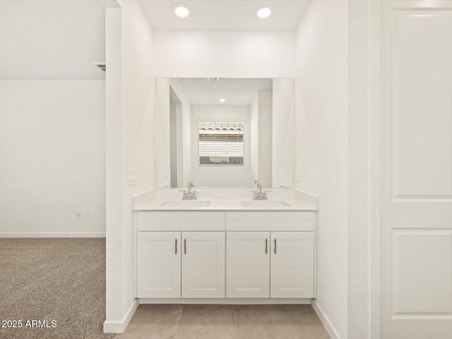 bathroom featuring tile patterned floors and vanity