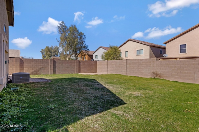 view of yard featuring central AC unit