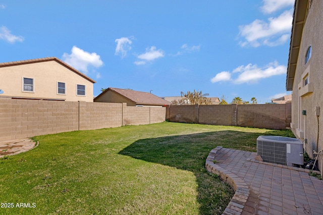 view of yard featuring central AC