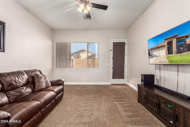 living room featuring carpet flooring and ceiling fan