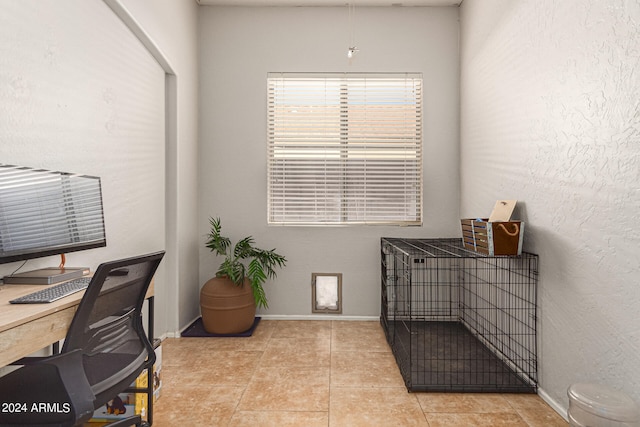 office area with light tile patterned floors