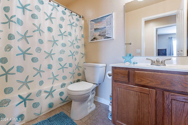 full bathroom with shower / bath combination with curtain, vanity, toilet, and tile patterned floors