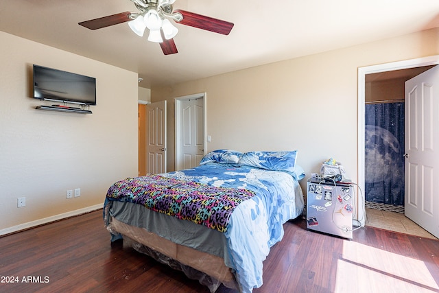 bedroom featuring ceiling fan and hardwood / wood-style flooring