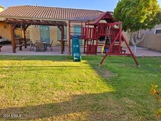 view of play area with a yard