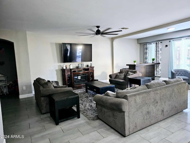 living room with ceiling fan