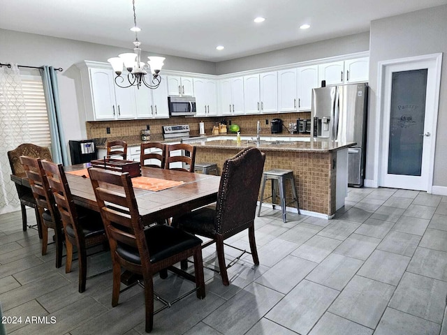 dining room featuring an inviting chandelier