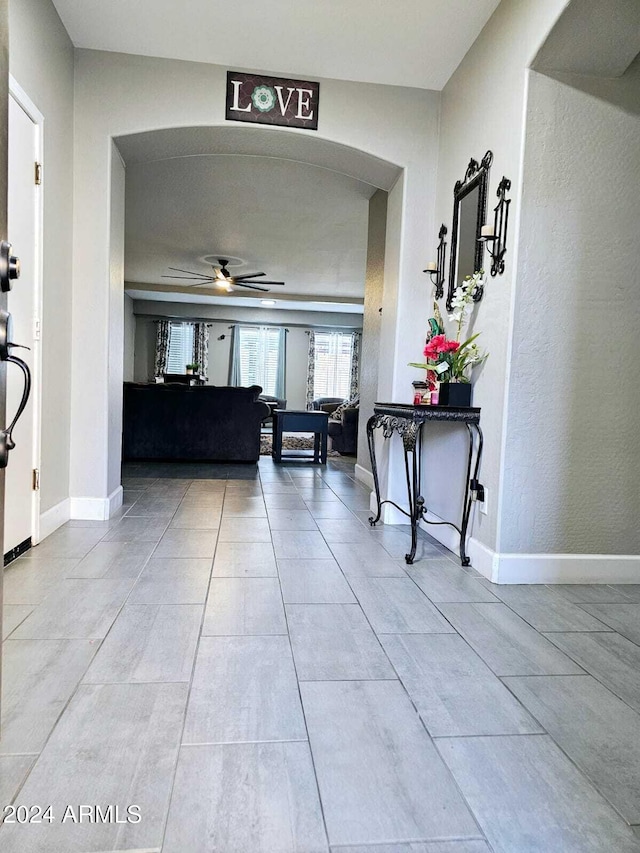 hallway with light tile patterned floors