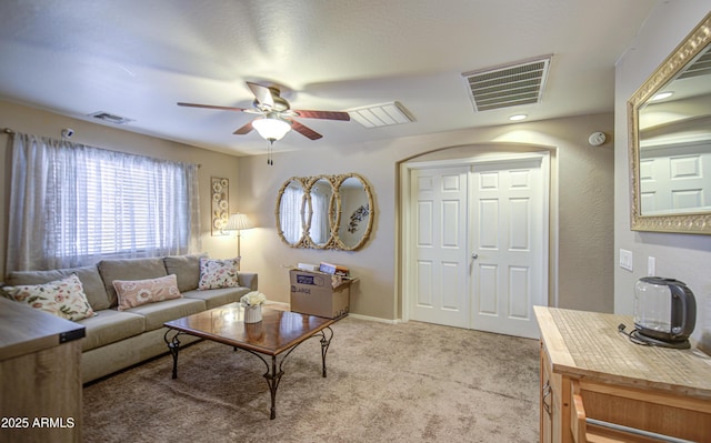 17374 W Adams St, Goodyear, AZ 85338 - carpeted living room with baseboards, a ceiling fan, and visible vents