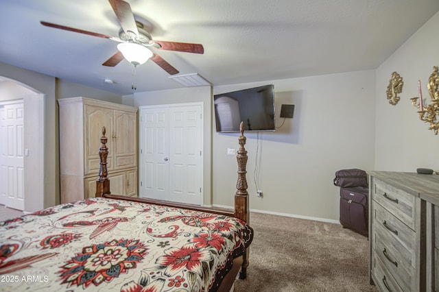 17374 W Adams St, Goodyear, AZ 85338 - carpeted bedroom featuring visible vents, baseboards, a ceiling fan, and arched walkways