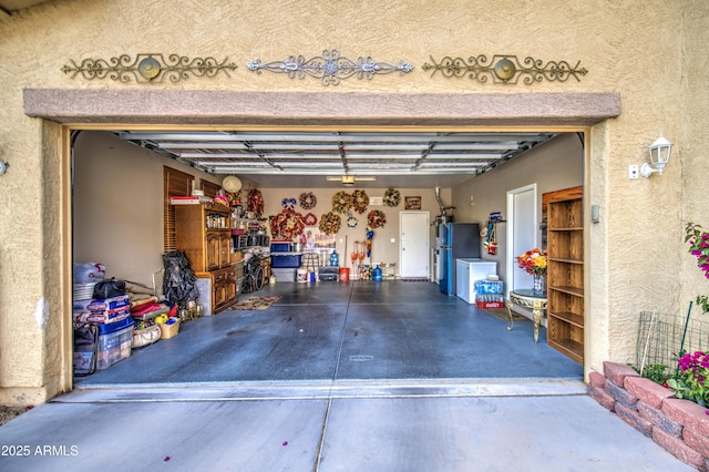 17374 W Adams St, Goodyear, AZ 85338 - garage with freestanding refrigerator and a textured wall