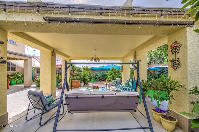 17374 W Adams St, Goodyear, AZ 85338 - view of patio featuring fence and outdoor lounge area
