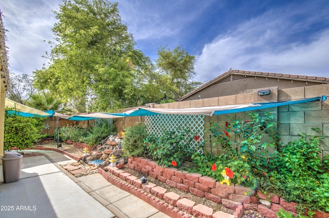 17374 W Adams St, Goodyear, AZ 85338 - view of yard featuring a fenced backyard and a patio area