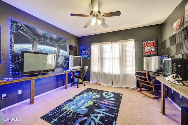 office area with ceiling fan and carpet flooring