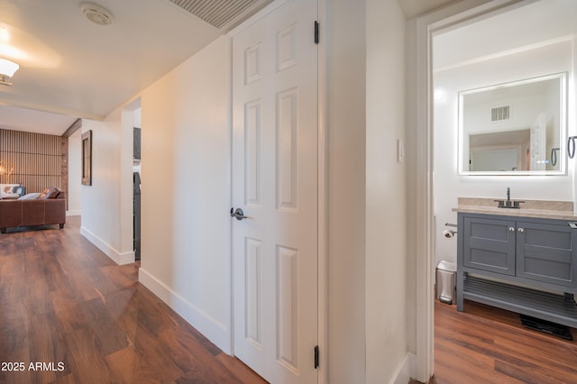 hall featuring dark wood-type flooring