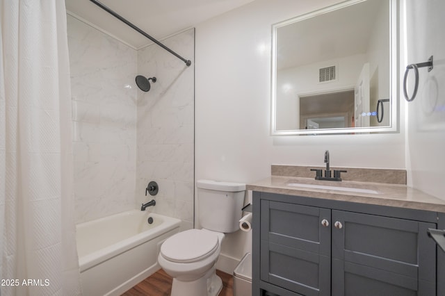 full bathroom featuring toilet, vanity, shower / bath combo, and hardwood / wood-style flooring