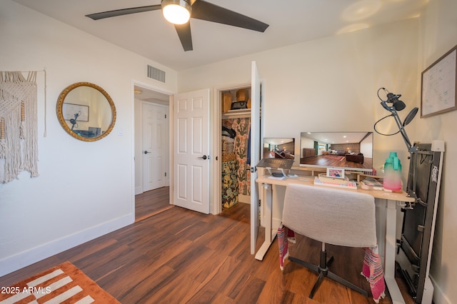 office space with ceiling fan and dark wood-type flooring