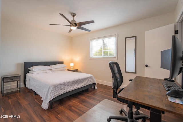 bedroom featuring dark hardwood / wood-style flooring and ceiling fan