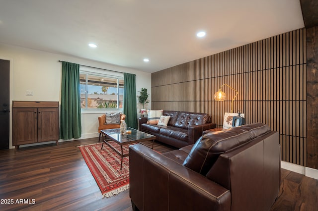 living room with dark hardwood / wood-style floors