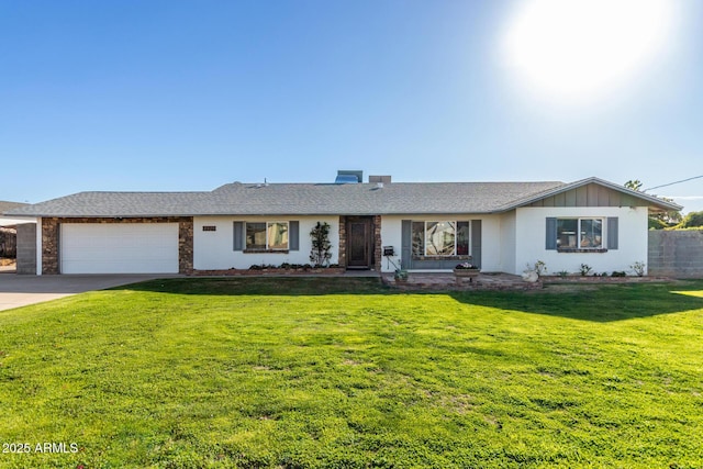 single story home featuring a garage and a front yard