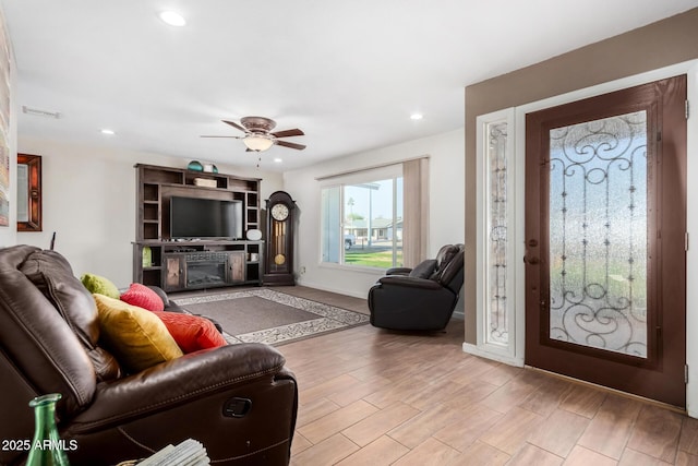 entrance foyer featuring ceiling fan