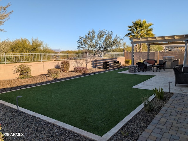 view of yard with a patio, an outdoor fire pit, and a pergola