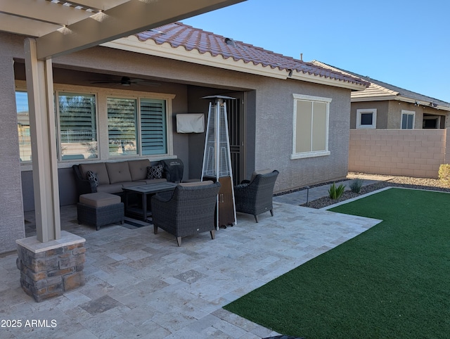 view of patio / terrace with an outdoor hangout area and ceiling fan