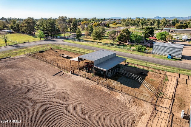 birds eye view of property with a mountain view