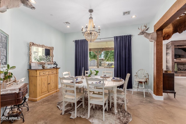 dining area with a chandelier