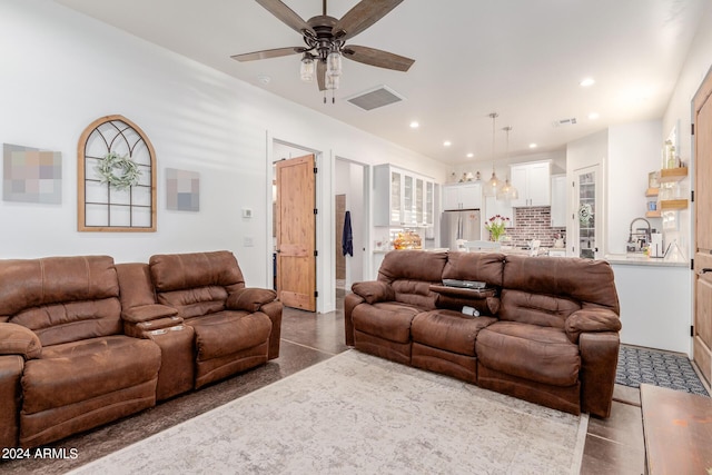 living room featuring ceiling fan