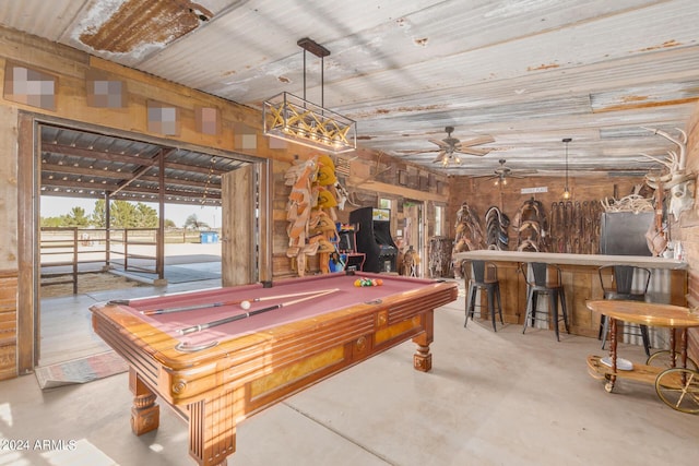 playroom with billiards, concrete flooring, wood ceiling, indoor bar, and ceiling fan