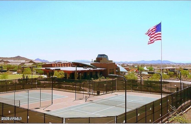 2023 W Yellowbird Ln, Phoenix, AZ 85085 - view of tennis court with a mountain view