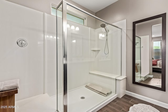 2023 W Yellowbird Ln, Phoenix, AZ 85085 - bathroom featuring a shower stall, wood finished floors, and connected bathroom