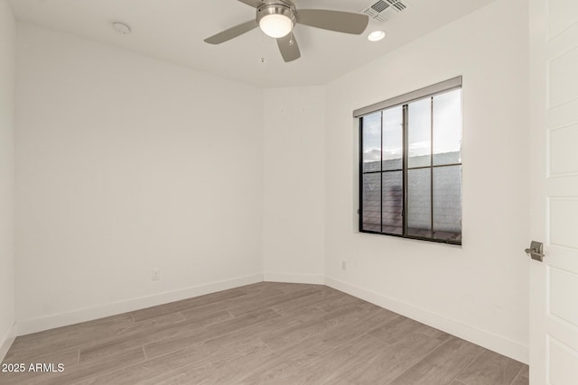 empty room featuring recessed lighting, visible vents, light wood-style floors, ceiling fan, and baseboards