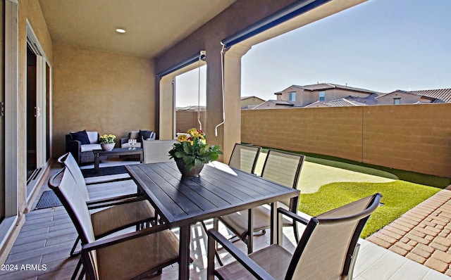 balcony with a patio and outdoor lounge area