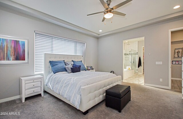 bedroom with ceiling fan, carpet, and ensuite bathroom