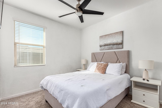 bedroom featuring ceiling fan and carpet floors