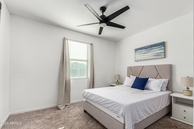 bedroom featuring ceiling fan and carpet floors