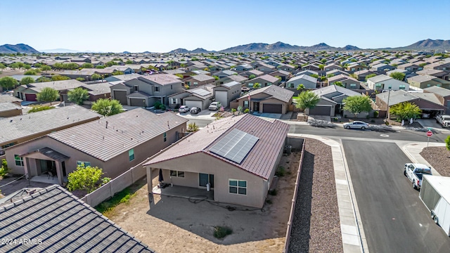 drone / aerial view featuring a mountain view