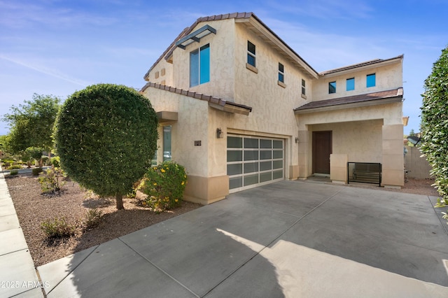 1502 E Goldcrest St, Gilbert, AZ 85297 - view of front facade with stucco siding, an attached garage, driveway, and a tile roof