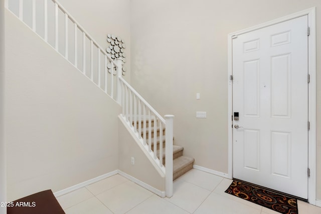 1502 E Goldcrest St, Gilbert, AZ 85297 - foyer with stairway, light tile patterned floors, and baseboards