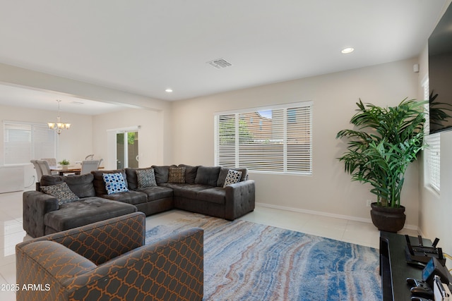 1502 E Goldcrest St, Gilbert, AZ 85297 - living area with light tile patterned flooring, a chandelier, healthy amount of natural light, recessed lighting, and baseboards