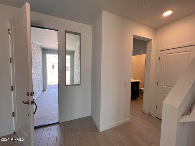 hall featuring light hardwood / wood-style floors