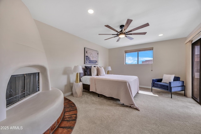 carpeted bedroom with baseboards, recessed lighting, and a ceiling fan