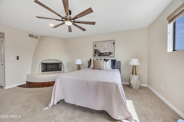 bedroom featuring visible vents, carpet, ceiling fan, and baseboards