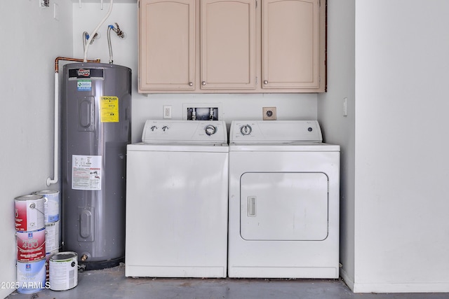 washroom with independent washer and dryer, cabinet space, and electric water heater