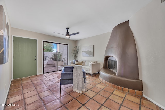 bedroom featuring baseboards, access to outside, and a ceiling fan