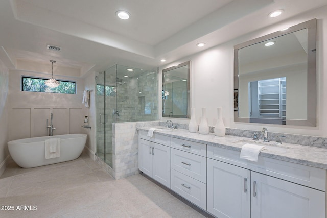 bathroom featuring tile patterned floors, vanity, and separate shower and tub