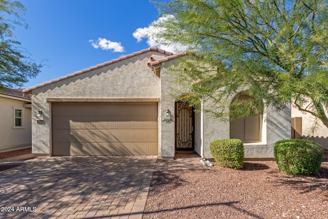 view of front of home featuring a garage