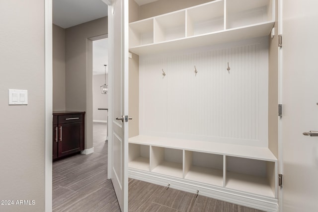 mudroom with light hardwood / wood-style floors