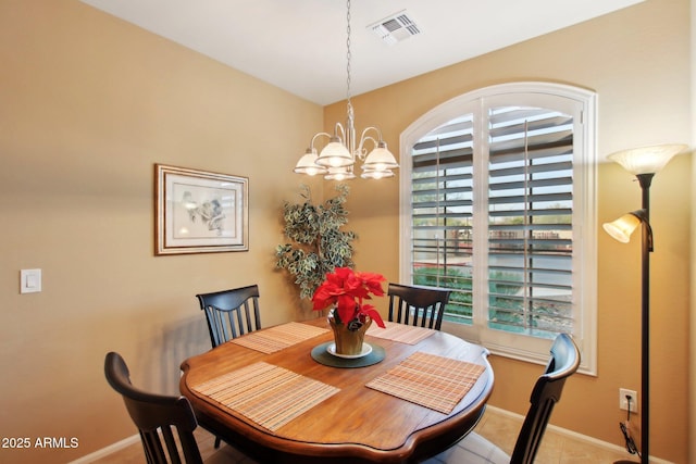 dining room with a chandelier